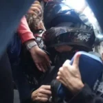 Venezuelan far-right politician MarĂa Corina Machado wearing a bike helmet and holding a blue purse, in a surreal video posted on social media on January 9, 2025. Photo: EDATV.NEWS.