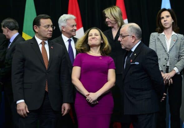 Canadian Minister of Foreign Affairs Chrystia Freeland (middle) stands with her Peruvian counterpart Nestor Francisco Popolizio Bardales (front left) Argentina’s Jorge Marcelo Faurie (front right), British Minister Responsible for the Americas and Europe Alan Duncan (middle back left) and United States Ambassador to Canada Kelly Craft (middle back right) during the 10th ministerial meeting of the Lima Group in Ottawa on Monday, Feb. 4, 2019. Photo: Sean Kilpatrick/Canadian Press/file photo.