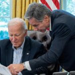 President Joe Biden, joined by Secretary of State Antony Blinken, is briefed on a resistance strike on 'Israel,' Saturday Oct. 7, 2023, in the Oval Office of the White House. Photo: Cameron Smith/White House.