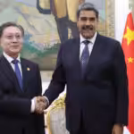 Venezuelan President Nicolás Maduro (right) shakes hand with the Vice President of the Standing Committee of the National People's Congress of China Wang Dongming (left). Photo: Presidential Press.