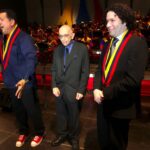 Late Venezuelan President Hugo Chávez (left), late maestro José Antonio Abreu (center), and Gustavo Dudamel (right), music director of the Simón Bolívar Symphony Orchestra and the Los Angeles Philharmonic. File photo.