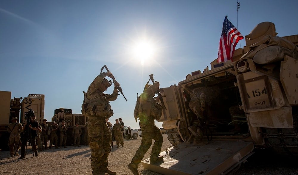 Crewmen enter Bradley fighting vehicles at a US military base at an undisclosed location in Northeastern Syria, on November 11, 2019.  Photo: AP/file photo.