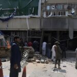 People gather outside the bank where a suicide bomber killed at least five people, Kunduz, Afghanistan, February 11, 2025. Photo: social media.