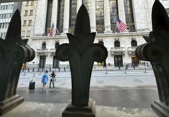 The New York Stock Exchange building viewed through some railings. Photo: AP/Peter Morgan.