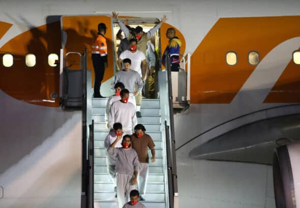 Migrants illegally detained at the US military base in Guantanamo, Cuba,  arriving in Venezuela on Thursday, February 20, 2025. Photo: Pedro Mattey/AFP.