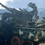 Lebanese tribal fighters with a military vehicle captured from HTS militants, in Hawik, Lebanon, February 6, 2025. Photo: social media.