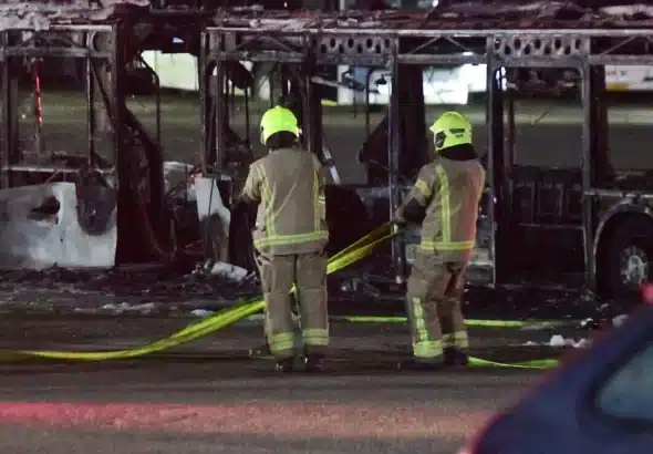 Firemen at the site of the bus explosion in Bat Yam. Photo: Avshalom Sassoni/Flash90.