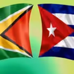 The flags of Guyana and Cuba. Photo: File photo.