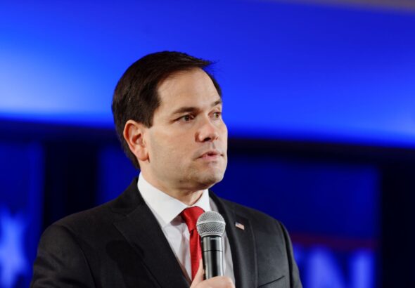 Marco Rubio with a microphone in his hand during an event in 2021. Photo: Michael Badon/file photo.
