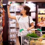 A woman selects products in a supermarket. File photo.