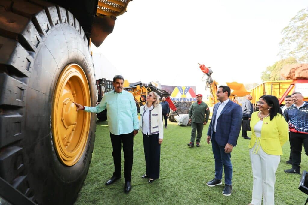 President Maduro stands in front of a massive tire. Photo: Venezuela Presidential Press.