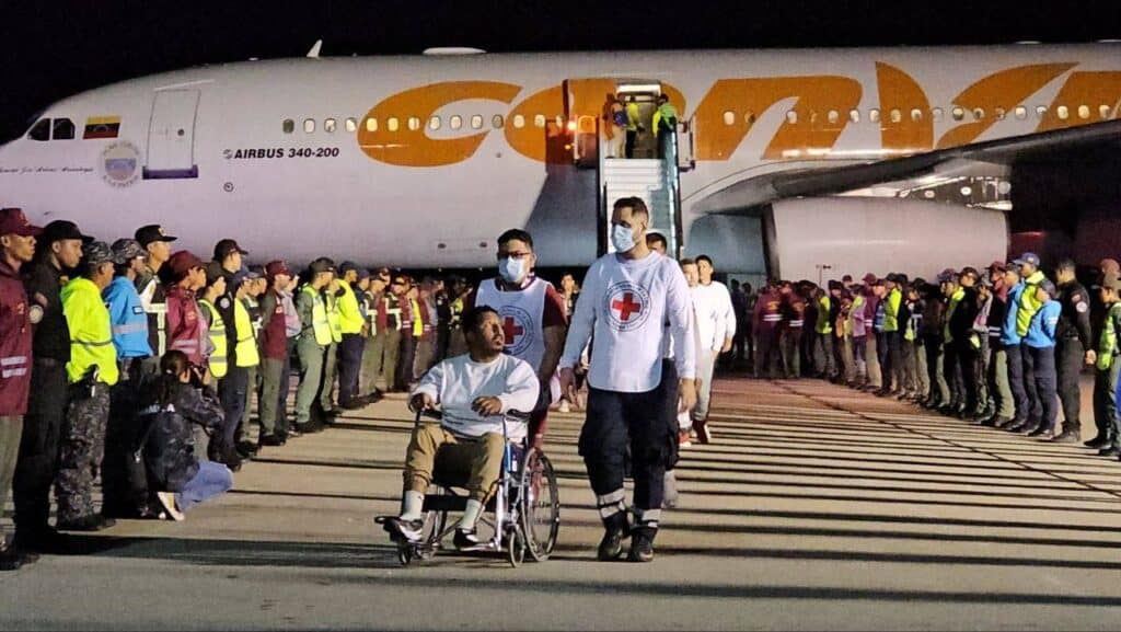 A Venezuelan migrant in a wheelchair being transported by Red Cross volunteers on Monday, March 24, 2025. Photo: MPPIJP.
