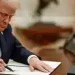 President Trump signs controversial Venezuela tariffs order in Oval Office. Photo: White House/file photo.