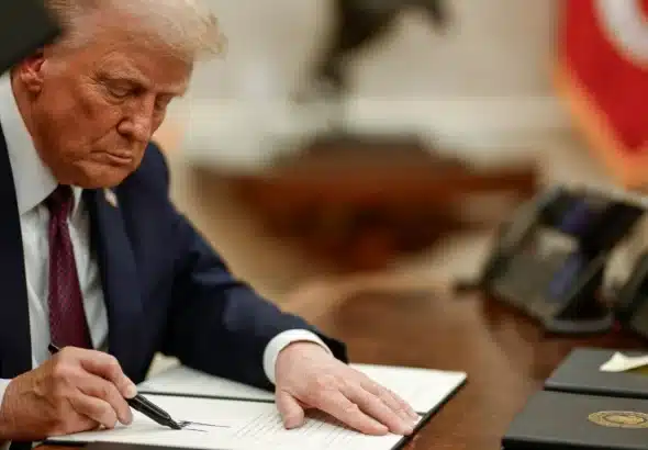 President Trump signs controversial Venezuela tariffs order in Oval Office. Photo: White House/file photo.