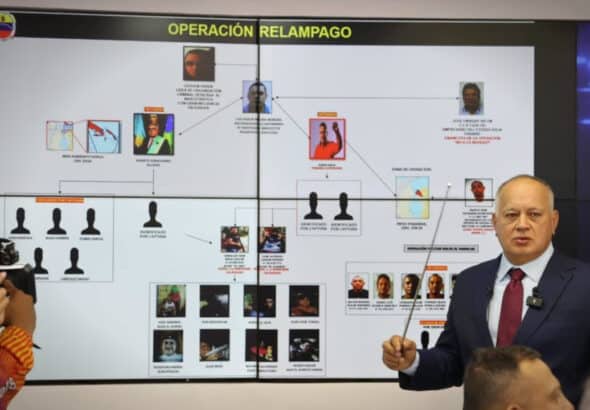 Venezuelan Interior Minister Diosdado Cabello displays a chart showing the individuals, arrested or sought, allegedly linked with a drug trafficking gang in Zulia state. Photo: Alba Ciudad.