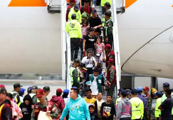 Venezuelan migrants arriving back home from Mexico on a Return to the Homeland Program flight, March 20, 2025. Photo: AFP.
