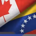 Flags of Canada and Venezuela. File photo.