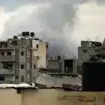 Smoke billows after an "Israeli" airstrike near the Bureij refugee camp in the central Gaza Strip, March 21, 2025. Photo: Eyad Baba/AFP.