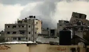 Smoke billows after an "Israeli" airstrike near the Bureij refugee camp in the central Gaza Strip, March 21, 2025. Photo: Eyad Baba/AFP.
