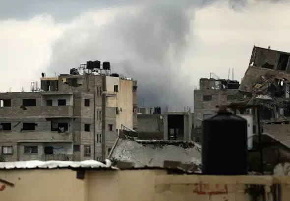 Smoke billows after an "Israeli" airstrike near the Bureij refugee camp in the central Gaza Strip, March 21, 2025. Photo: Eyad Baba/AFP.