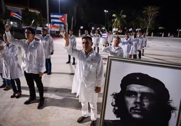 Doctors and nurses from one of Cuba’s Henry Reeve brigades are bid farewell before leaving to Turkey to care for the victims of the earthquake the, at the Central Unit of Medical Cooperation in Havana, on February 10, 2023. Photo: Yamil Lage/AFP via Getty Images.