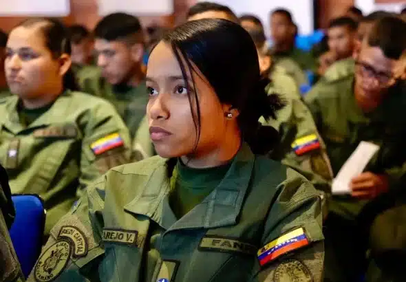 Young people from the Bolivarian Military Academy of Venezuela at the ALBA-TCP Forum welcomed the Venezuelan ambassador to Syria, José Gregorio Biomorgi. March 11, 2025. Photo: ALBA-TCP.