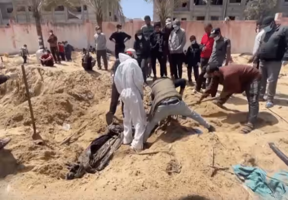 Mass graves in Gaza following Israel's withdrawal. Photo: The Palestine Chronicle/video grab.