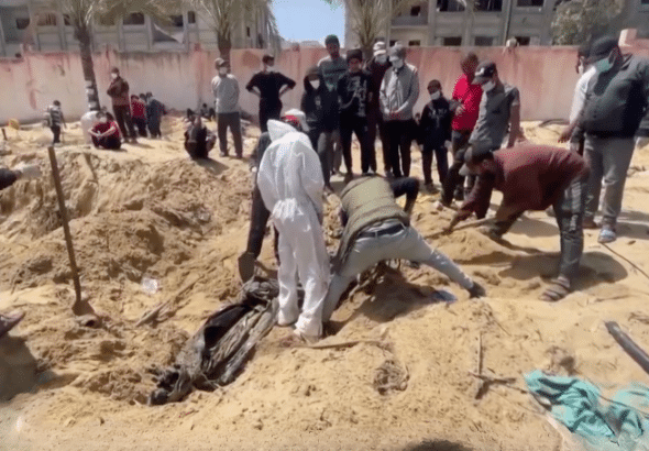 Mass graves in Gaza following Israel's withdrawal. Photo: The Palestine Chronicle/video grab.