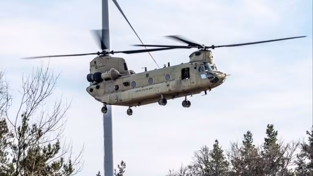 A CH-47F Chinook from the 1st Battalion, 214th Aviation Regiment, 12th Combat Aviation Brigade flies over the Grafenwoehr Training Area, Germany for aerial gunnery on March 3, 2025. Photo: US Army.