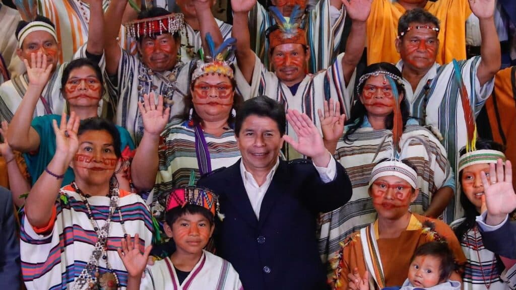 Peruvian President Pedro Castillo poses with a group of indigenous people during his electoral campaign. Photo: X/@PedroCastilloTe.