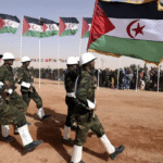 Members of the Sahrawi People’s Liberation Army parade with Polisario Front’s flags in the Sahrawi Arab Democratic Republic, February 27, 2016. Photo: Farouk Batiche/AFP.