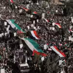 People rally to protest against Zionist air strikes on Gaza, in Sanaa, Yemen. Photo: Khaled Abdullah/Reuters.