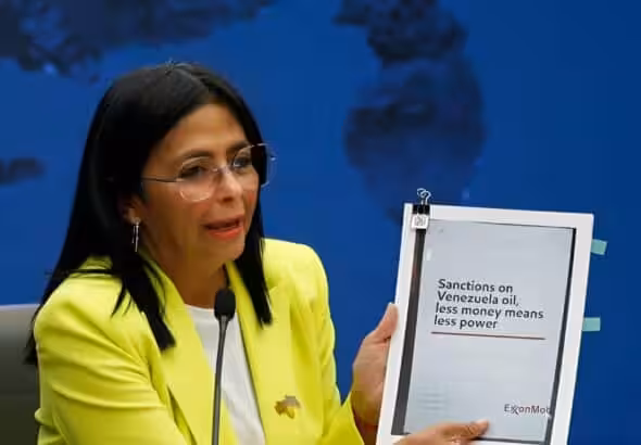 Venezuela's Vice President and Oil Minister Delcy Rodríguez holds a document as she addresses the media in Caracas, Venezuela, March 10, 2025. Photo: Reuters.