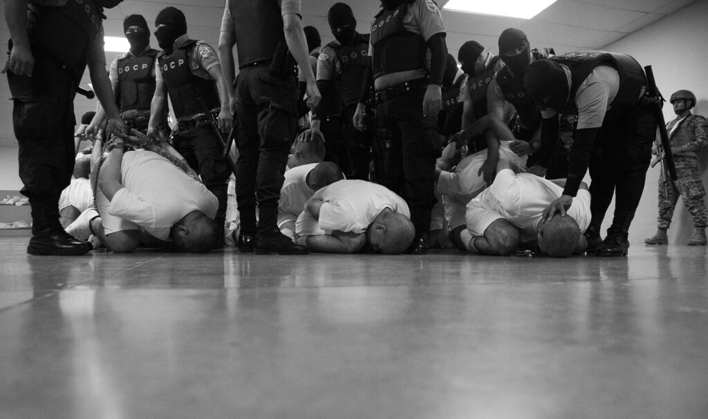 Venezuelans deported by the US government to El Salvador being treated like terrorists. Photo: Philip Holsinger/Time.