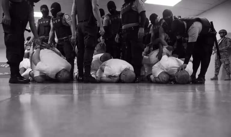 Venezuelans deported by the US government to El Salvador being treated like terrorists. Photo: Philip Holsinger/Time.