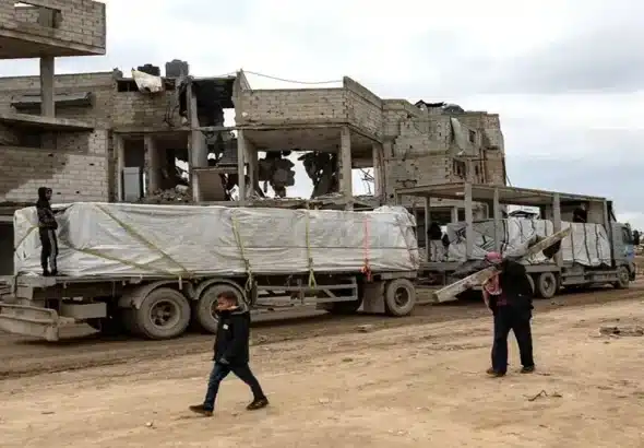 A limited number of aid trucks have been allowed to enter Gaza, and reconstruction efforts have been greatly hindered by the Zionist occupation. File photo.
