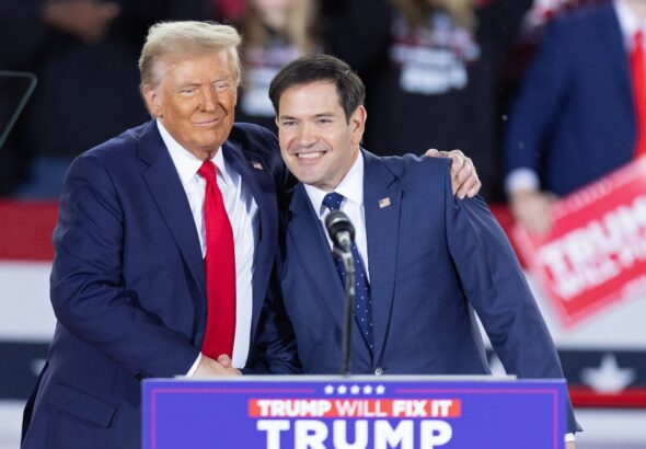President Donald Trump greets Sen. Marco Rubio during a campaign rally at the J.S. Dorton Arena in Raleigh, North Carolina, on November 4, 2024. Photo: Ryan M. Kelly/AFP/file photo.