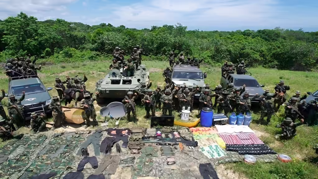 Venezuelan military personnel pose with part of the drugs and equipment seized during the Lightning of Catatumbo security operation in Zulia state. Photo: CEOFANB.