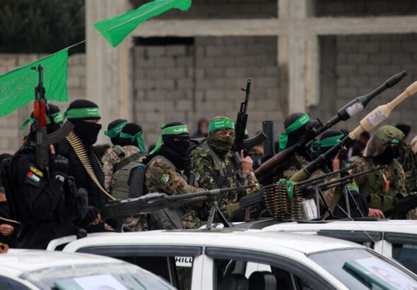 Fighters of the Palestinian resistance movement Hamas are seen in Nuseirat refugee camp in the central Gaza Strip on February 22, 2025. Photo: AFP.