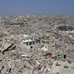 Aerial of war-devastated neighborhood in the Jabalia refugee camp in the northern Gaza Strip on April 2, 2025. Photo: Bashar Taleb/AFP.