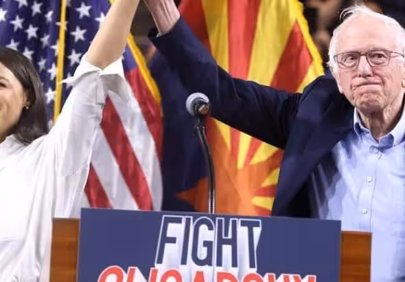 Congresswoman Alexandria Ocasio-Cortez and Senator Bernie Sanders at a “Fight Oligarchy” rally at Mullett Arena in Tempe, Arizona, in March. Photo: Gage Skidmore/Flickr.