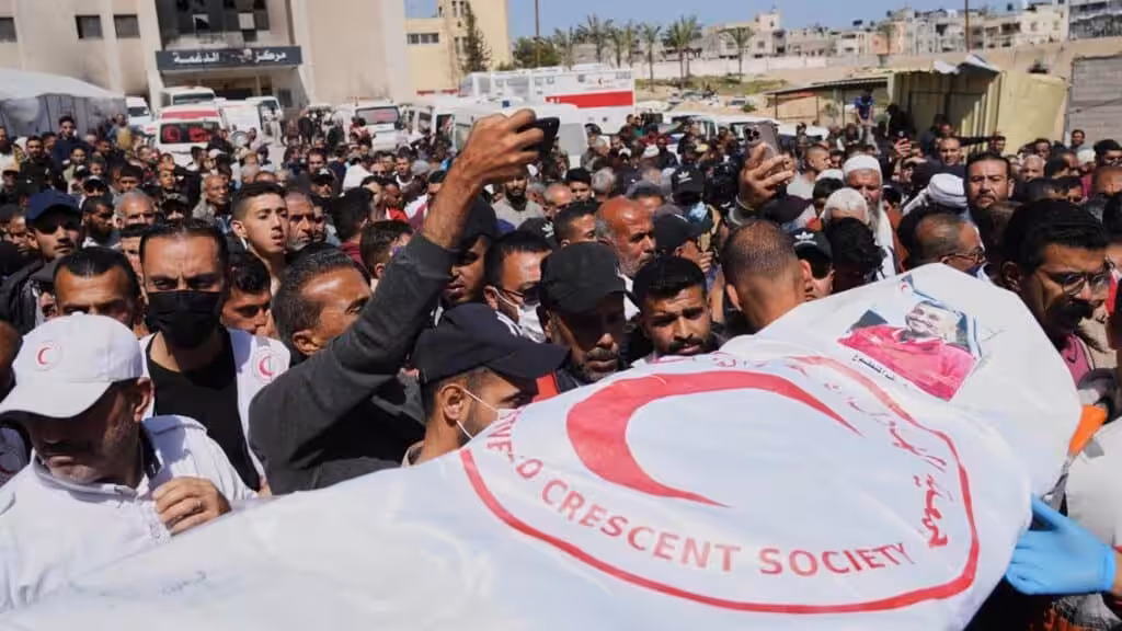 Funeral service. Photo: Abdel Kareem Hana/AP.