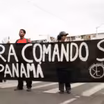 Demonstrators hold banner reading “Southern Command out of Panama.” Panama City, April 8.
