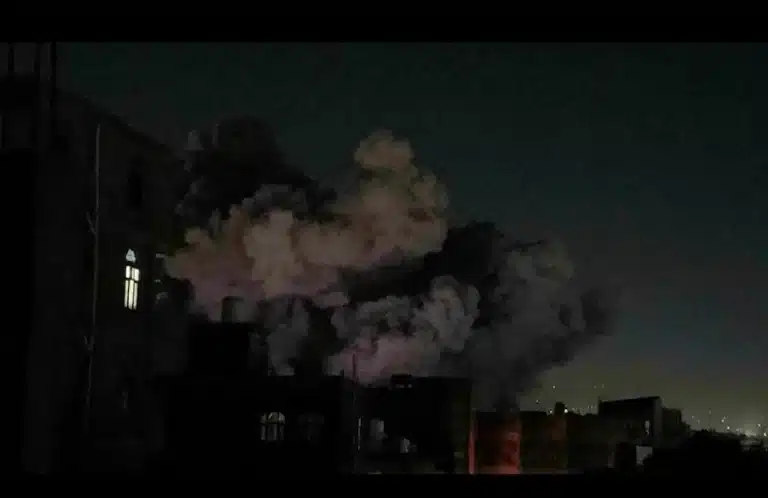 In this image taken from video, smoke rises after an airstrike in Sanaa, Yemen, Friday March 28, 2025. Photo: AP.