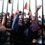 Chavista supporters surrounding Miraflores Palace in Caracas on April 13, 2002, demanding the return of briefly ousted President Hugo Chávez. File photo.