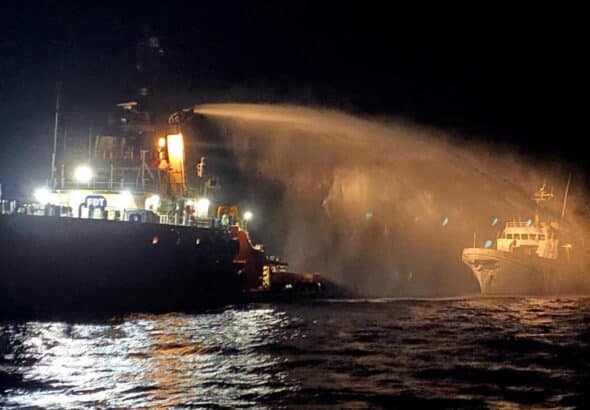 A tug vessel puts out a fire on the Gaza Freedom Flotilla vessel, Conscience, off the coast of Malta on May 2, 2025. Photo: Malta Government Department of Information via Reuters.