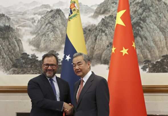Chinese Foreign Minister Wang Yi and Venezuelan Foreign Minister Yvan Gil before their meeting at the Diaoyutai State Guesthouse in Beijing ahead of the China-CELAC Forum, on May 12, 2025. Photo: Florence Lo/EFE/EPA.