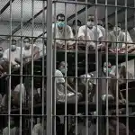 People imprisoned in a CECOT prison cell in El Salvador. Photo: Marvin Recinos/AFP.