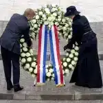 The Dutch king and queen attending Holocaust Remembrance Day. This solemn occasion has recently become controversial, as many in Dutch society have expressed views that certain groups, including Moroccan-Dutch citizens and Muslims, should not participate in these commemorations.