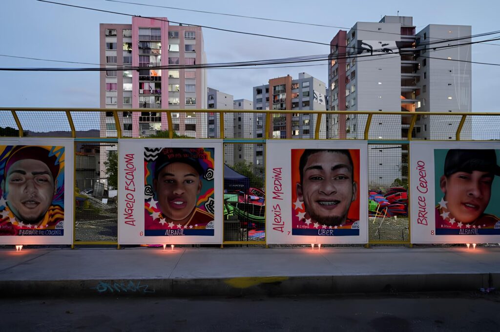 Mural in Caracas with faces of the Venezuelan migrants illegally imprisoned in El Salvador. Photo: Reuters/Gaby Oraa.